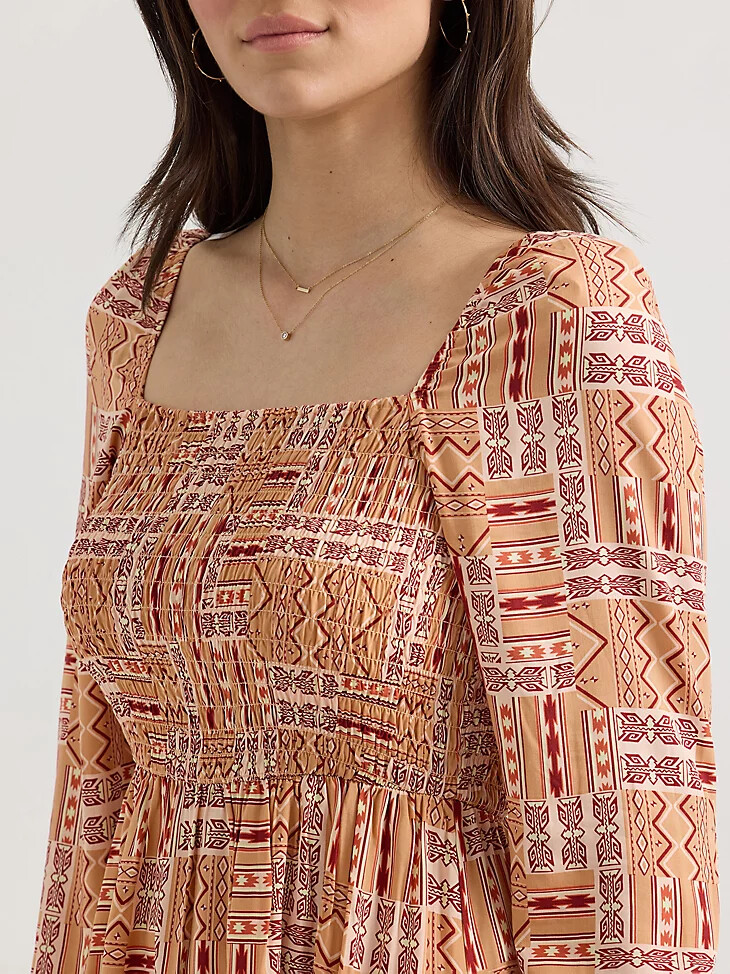 abito da donna con corpetto arricciato e linea ad a colore geo orange