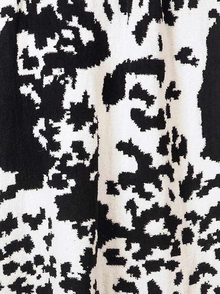 coperta elasticizzata wrangler mucca nera e bianca